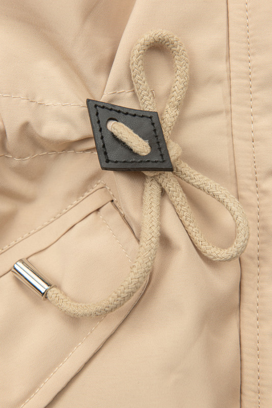 Béžová prechodná parka s modrou podšívkou