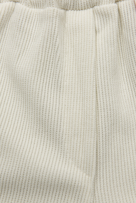 Ecru ležérne nohavice s gumou v páse