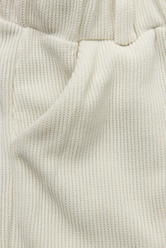 Ecru ležérne nohavice s gumou v páse