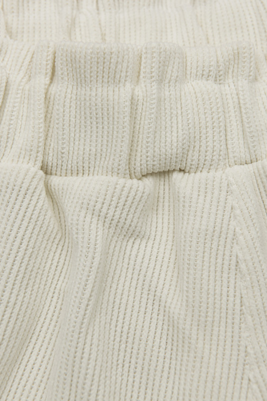 Ecru ležérne nohavice s gumou v páse