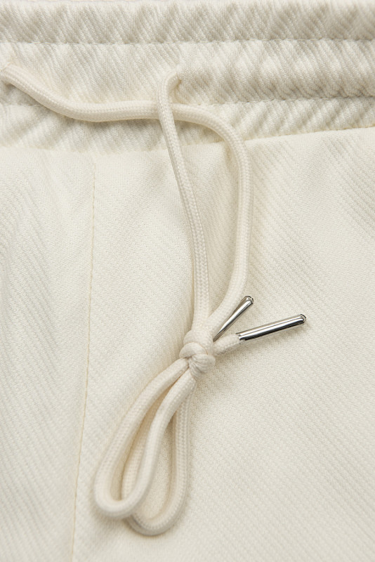 Ecru športové nohavice s vreckami