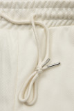 Ecru športové nohavice s vreckami