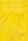 Žlté nohavice so šnurovaním v páse
